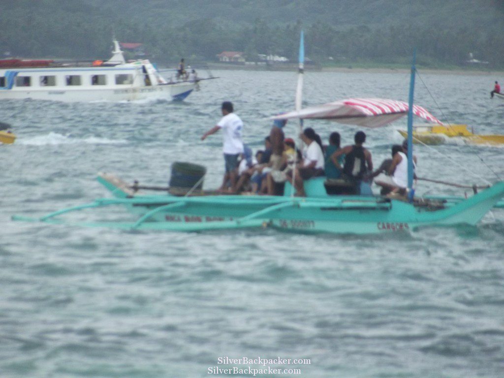 Boats ferry passengers to Caticlan