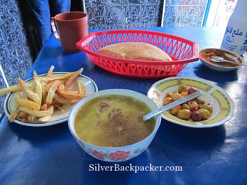 chefchaouen eatery pea soup, chips, olives and bread. Cheap Eats in Chefchaouen, Morocco