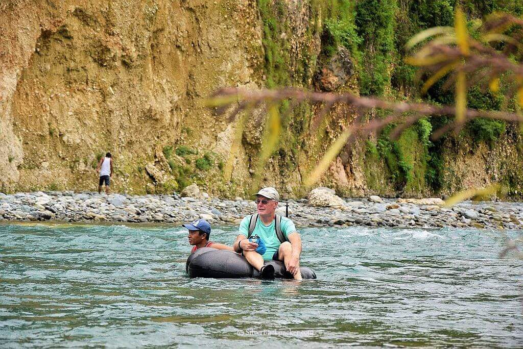 Tubing across the river Maar-Arbis Falls, Lagayan, Abra