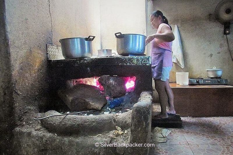 Wood burning fire for cooking Pancit Miki at Acostas Bangued