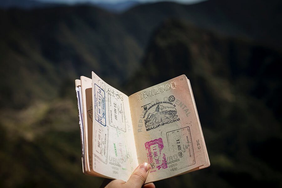 Open Passport with visa stamps. Preparing for your Australian Adventure