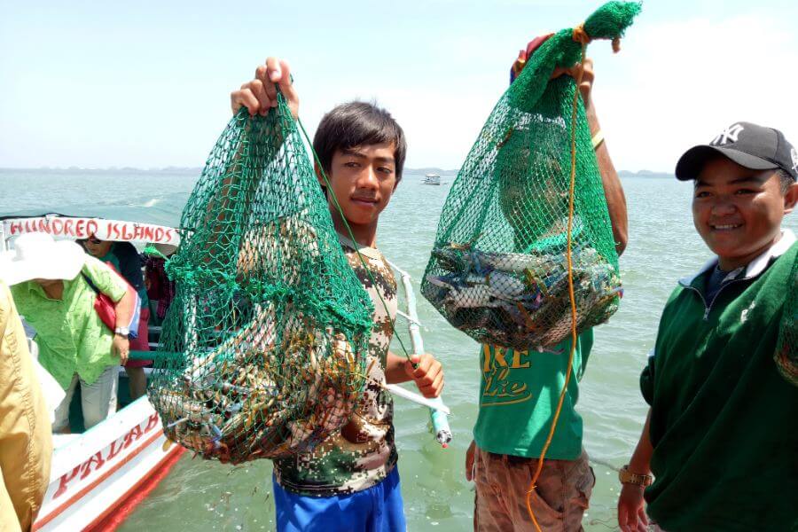 Fishermen with their days catch