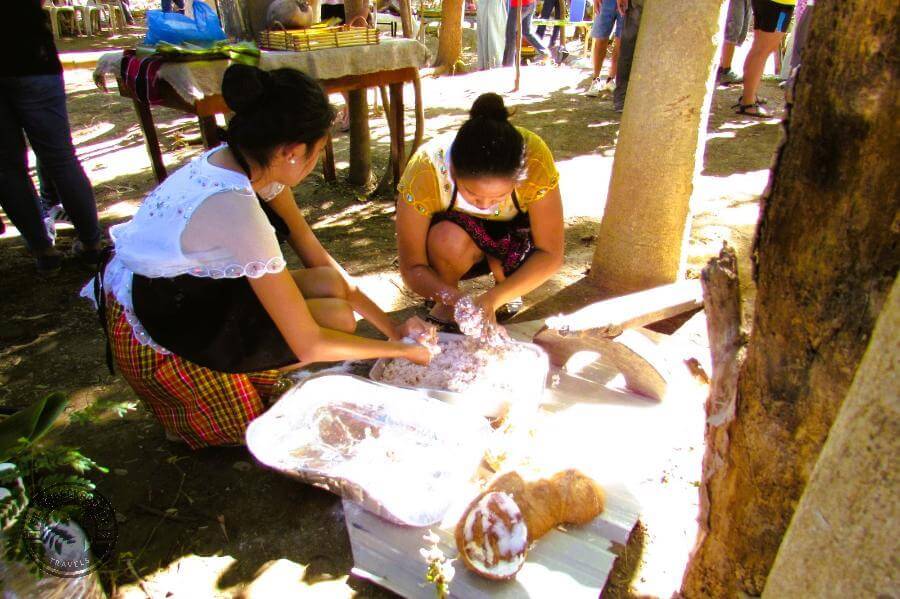 squeezing grated coconut for coconut milk