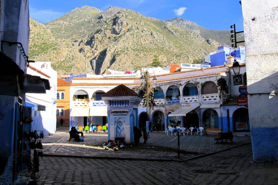 sit in one of the squares and people watch in chefchaouen