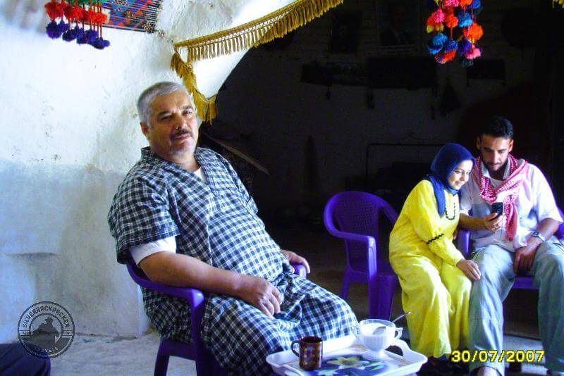 a family in their beehive house, sarouj, syria