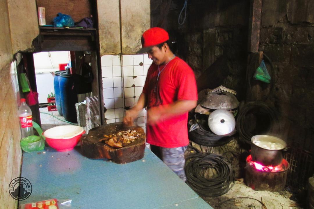 chopping meat on wooden board